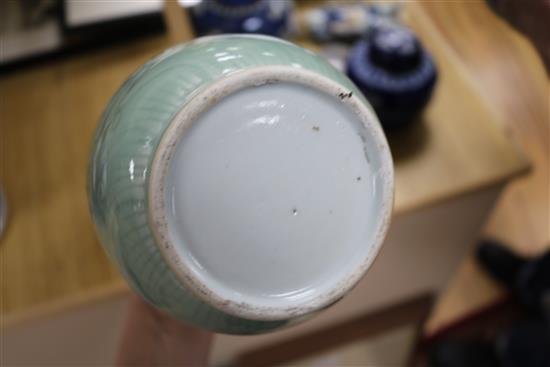 A Chinese blue and white dragon vase, a figure, two jars, teabowl and a famille verte vase